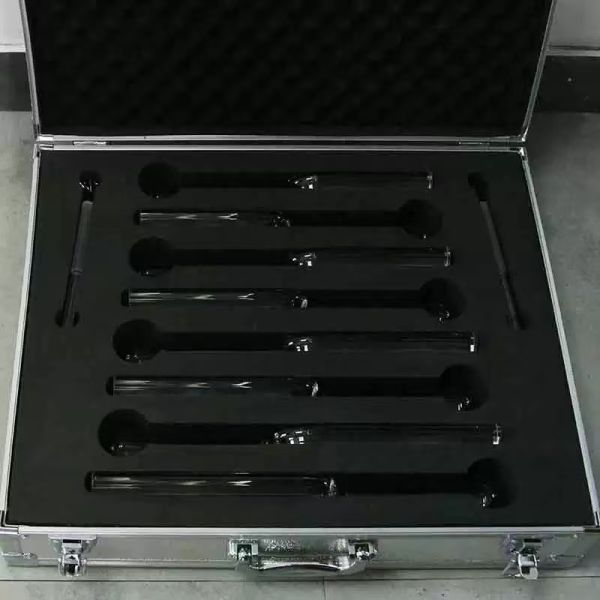 Crystal tuning fork transparent quartz gentle tapping on the ear for precise tuning and stress relief