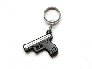 China Custom Logo Mini Key Chains Silicone Toy Gun Soft PVC Keychain on sale