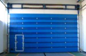 Cheap Blue Color Electric Sectional Garage Doors Coated Photoelectric Sensors for sale