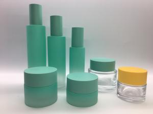 China Straight Round Glass Lotion Pump Bottle And Cream Jar For Skincare Packaging on sale