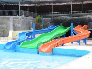 China Bouncy Water Park Slide Equipment Hillside Water Slide Heavy Duty Pool Slide on sale
