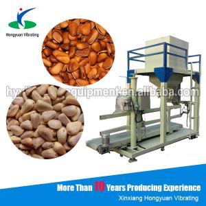 Cheap rational automatic weighing packaging machine , pine nut bagging machine for sale
